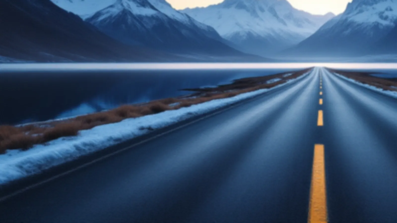 An empty road along a still blue lake reflecting snowy peaks at dawn, the GearboxRate view of personal loan rates online, $100 – $5,000